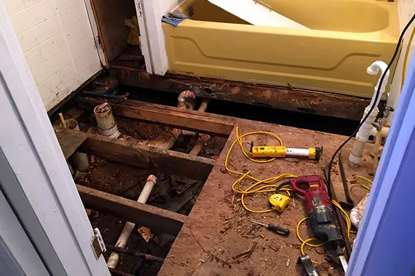 Hidden mold growth from water damage behind a wall